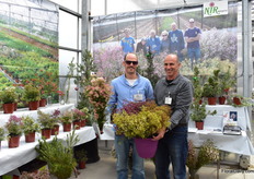 Asaf Nir with his father Nitzan Nir. Asaf is holding rice flower and Nitzan color wax. The color of this wax comes from the plant itself. It has not been painted, tinted or dyed.